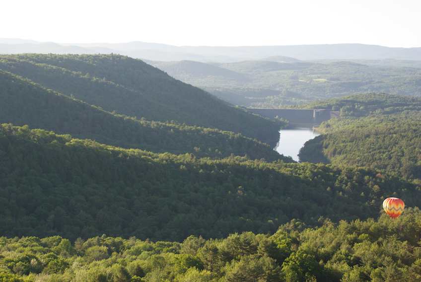 A line of hills, with the Hartland Dam beyond