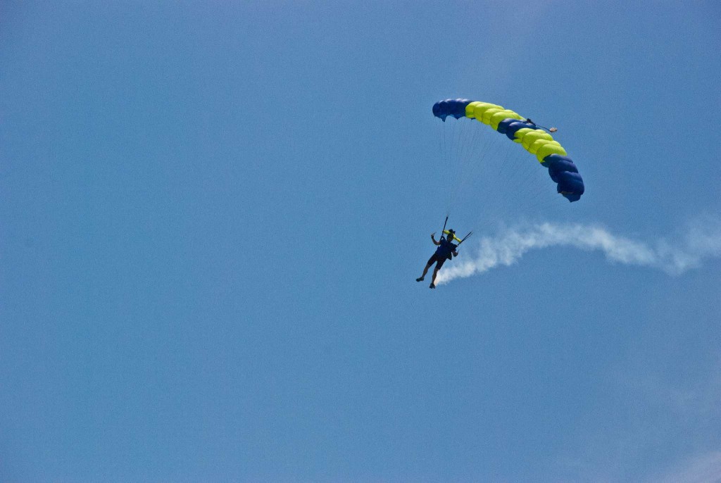 Skydiver trailing smoke