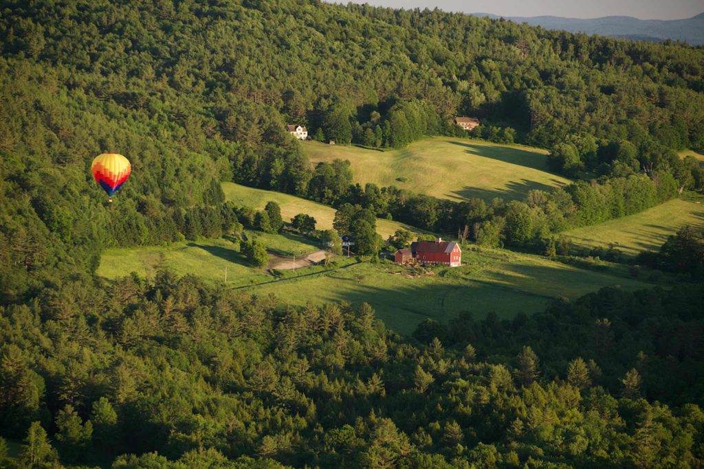 Balloon over a farmhouse