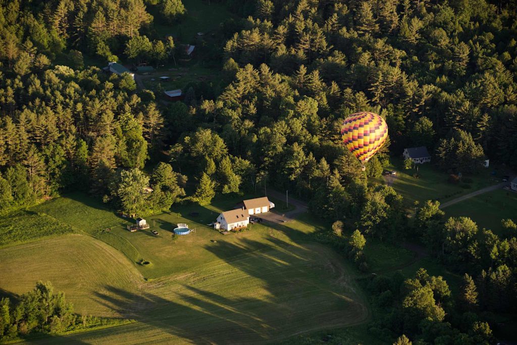 Balloon approaching a field