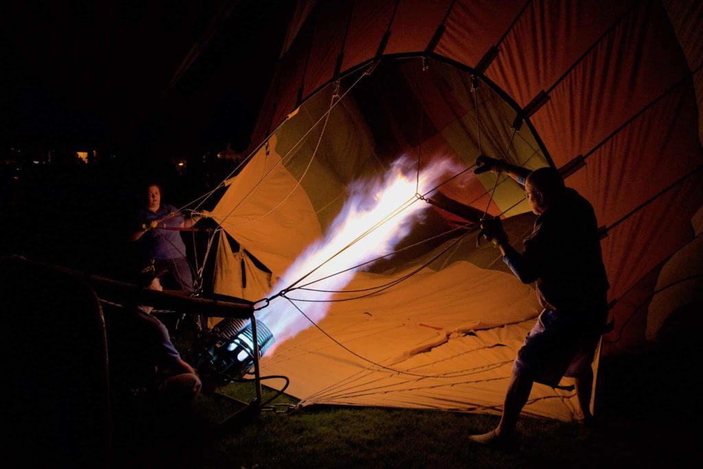 Preparing for the glow, heating the air to make the balloon rise