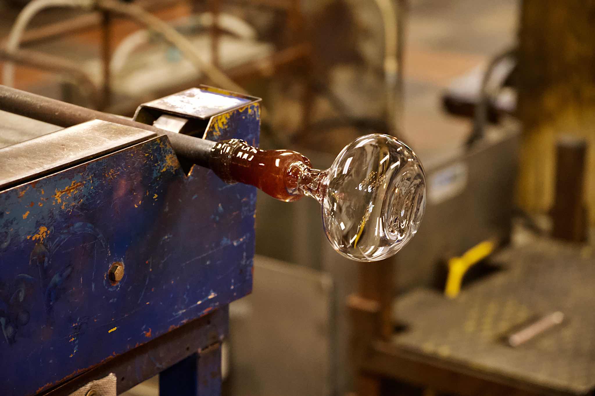 Glass vase being formed at the Simon Pearce factory Ted O’Hara