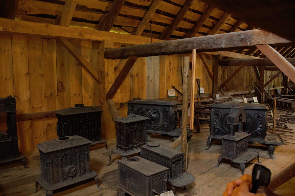 Collection of stoves in the upstairs of the barn