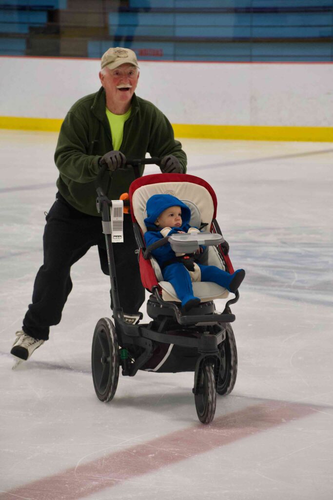 om pushing John Francis around the ice