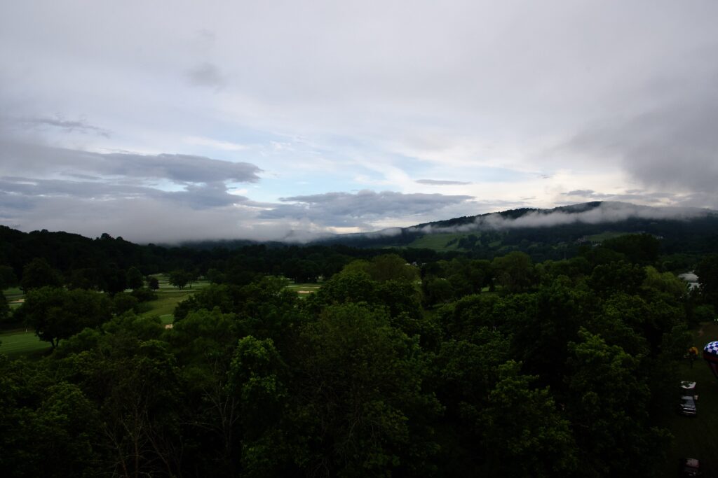 Clouds and fog banks wreathing the hills