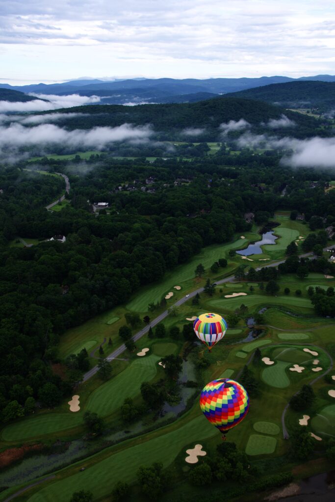 Balloons low over the golf course