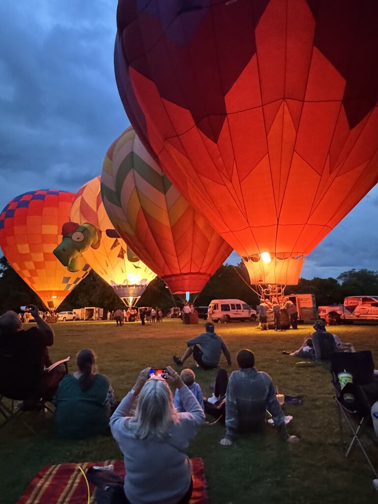 Several balloons fire their burners
