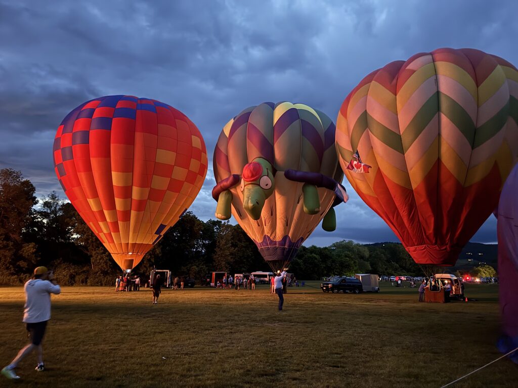 Balloons reflecting the light from another balloon