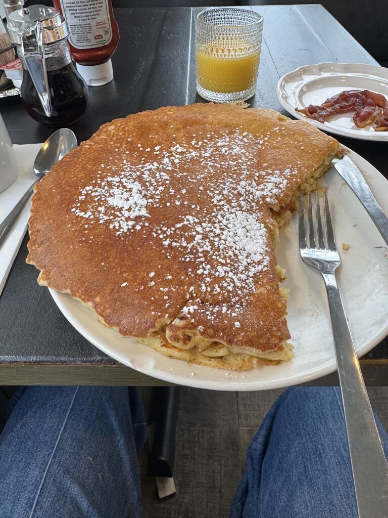 Huge, partly eaten pancake