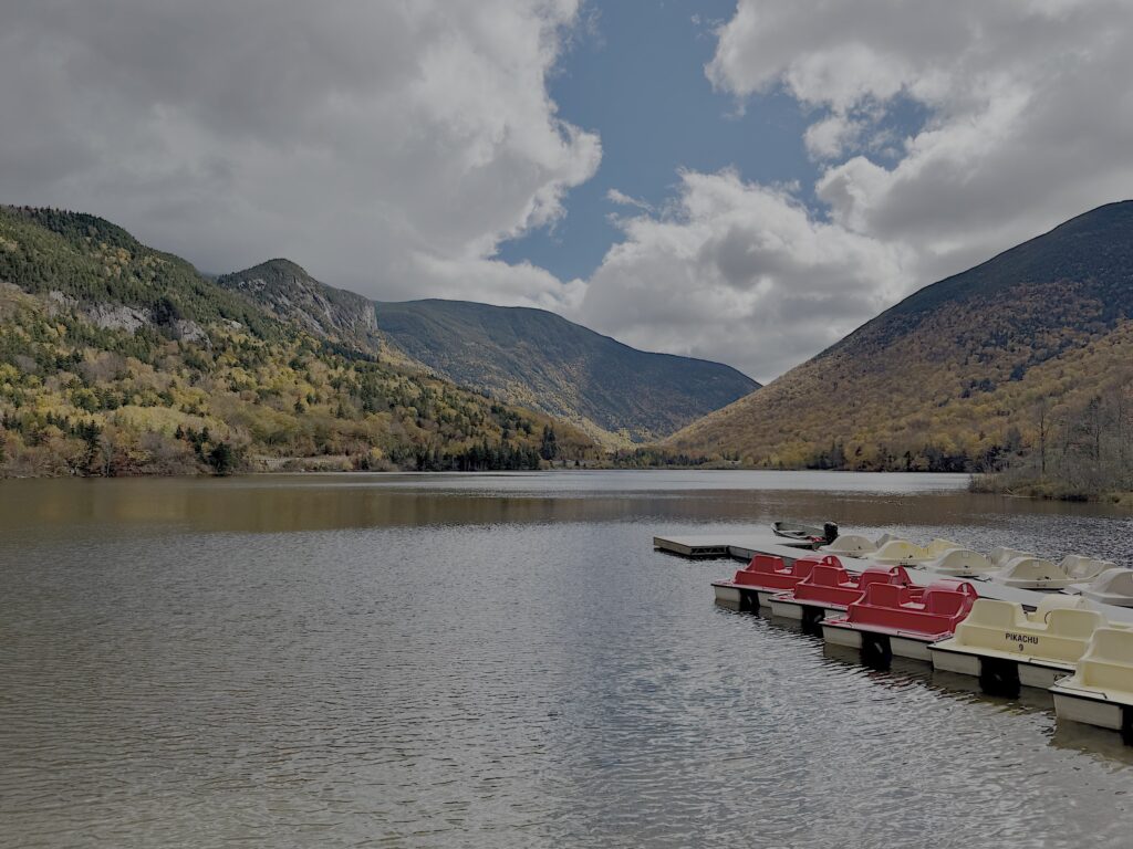 Mountains, clouds, and pedal boats